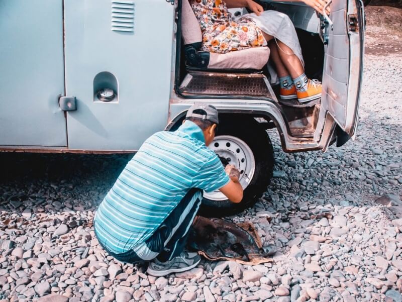 Driver fixing russian van